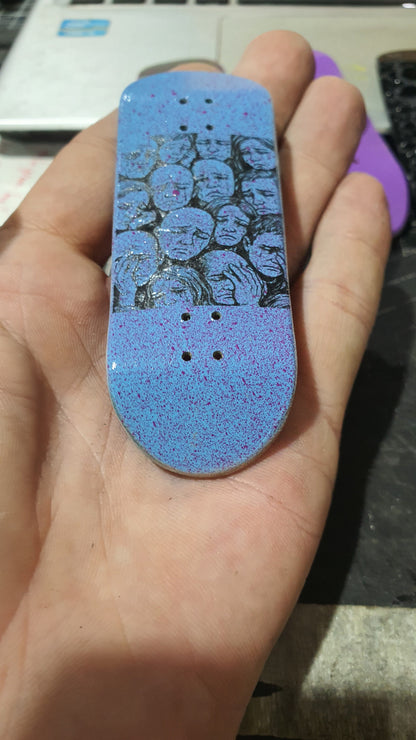 Saigon Skateboards 34mmx97mm 5-ply Canadian Maple Fingerboard "Faces of sadness "