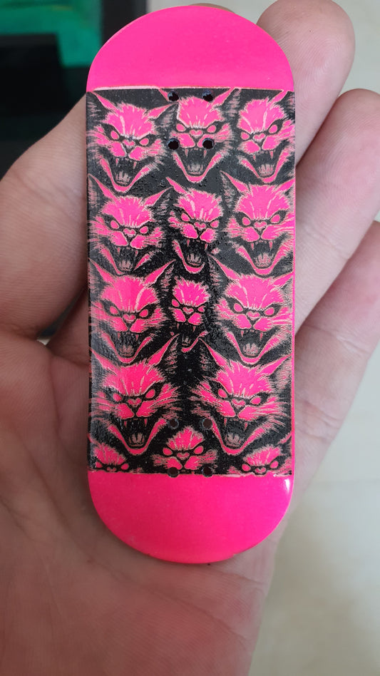 Saigon Skateboards "Pink cats" 5-ply Canadian Maple Fingerboard 33.3mmx98mm popsicle shape. Medium kicks and concave.
